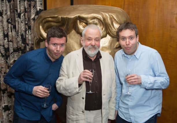 Mike Leigh with his sons Toby, left and Leo at the Fellowship lunch yesterday. Picture: PA