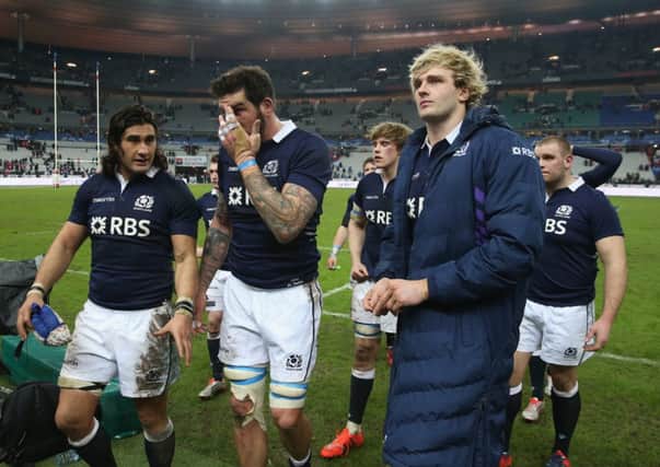 Dejected but by no means downcast: (from left) Blair Cowan, Jim Hamilton and Richie Gray. Picture: Getty