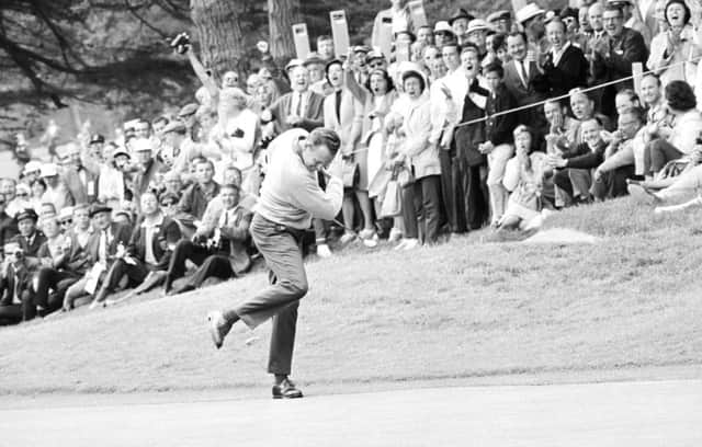 Billy Casper shows his joy after sinking a putt during a play-off with Arnold Palmer at the 1966 US Open. Picture: AP