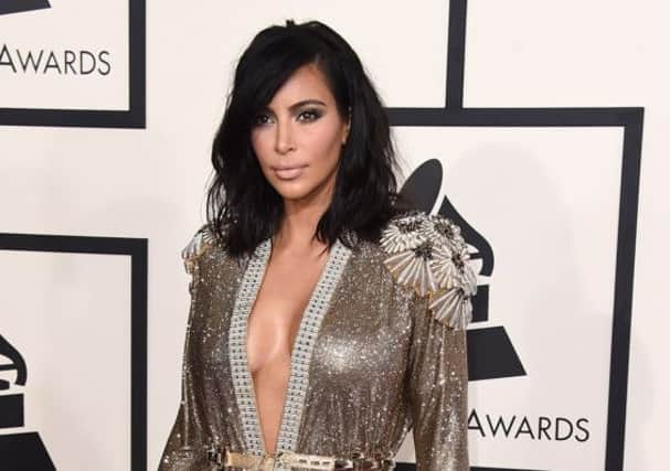 Kim Kardashian arrives at the 57th annual Grammy Awards. Picture: AP