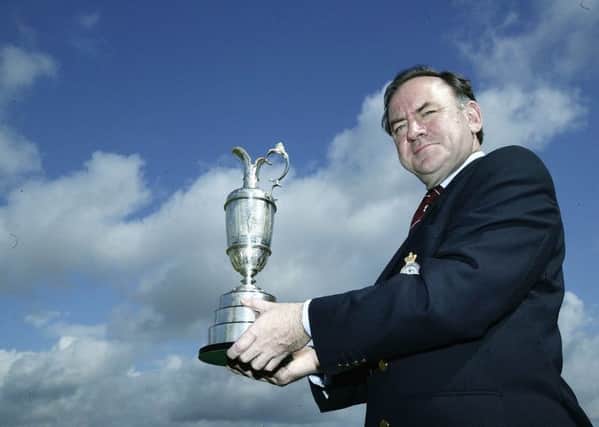 R&A chief executive Peter Dawson with the trophy for the Open Championship, which is to be televised on Sky. Picture: David Cannon/Getty