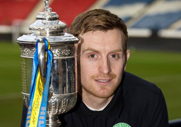 Hibernian captain Liam Craig with the Scottish Cup at yesterdays Hampden draw. Picture: Alan Harvey/SNS