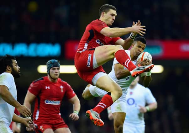 Wales player George North and Anthony Watson of England (l) compete for a high ball. Picture: Getty