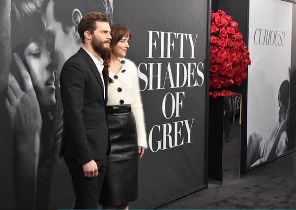 Actors Jamie Dornan and Dakota Johnson attend a publicity event for the Fifty Shades Of Grey film. Picture: Getty