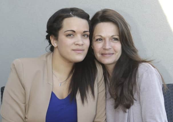Sophie Serrano, right, poses withdaughter Manon, who she unwittingly raised as her own. Picture: Lionel Cironneau