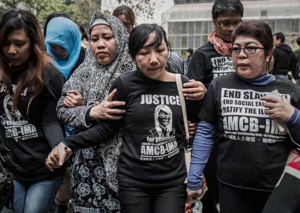 Erwiana Sulistyaningsih leaves court after hearing the verdict. Picture: Getty
