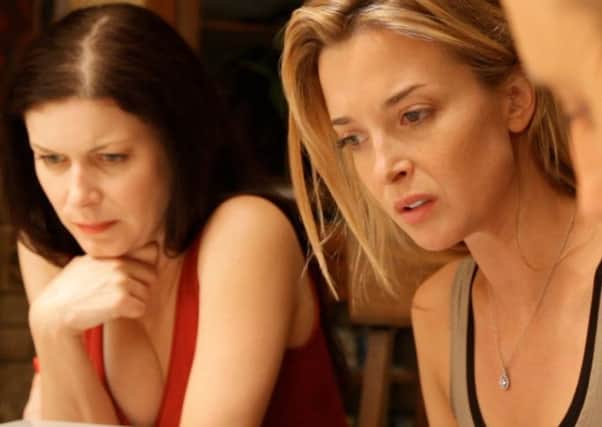 Emily Foxler and Lauren Maher star in cerebral indie sci-fi film Coherence. Picture: Contributed