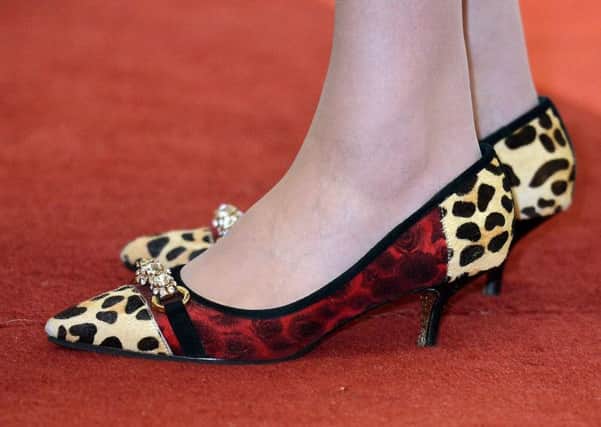 Theresa May's famous kitten heels. Auction guests paid thousands for a range of auction prizes at the Black and White Election Foundation ball at Londons Grosvenor Hotel in aid of Tory funds. Picture: PA