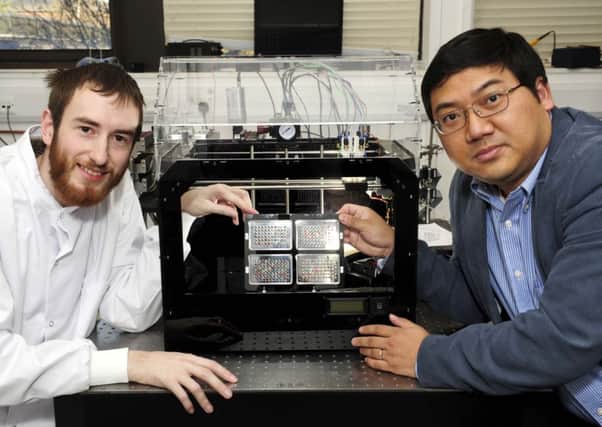 Bioprinting pioneers Alan FaulknerJones, left, and Dr Will Shu. Picture: Colin Hattersley