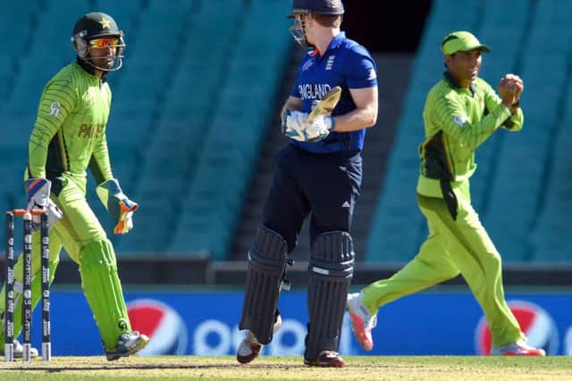 Eoin Morgan looks around as he is caught by Pakistans Younis Khan for a duck in Sydney. Picture: AFP/Getty