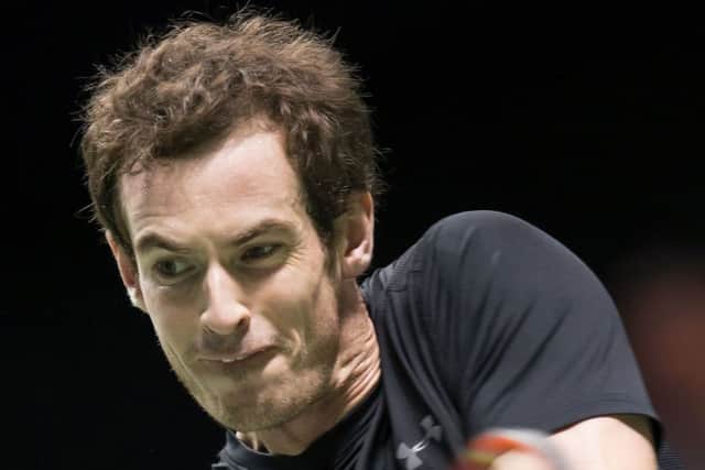 Andy Murray returns the ball to Nicolas Mahut during his straight sets win in Rotterdam. Picture: AFP/Getty