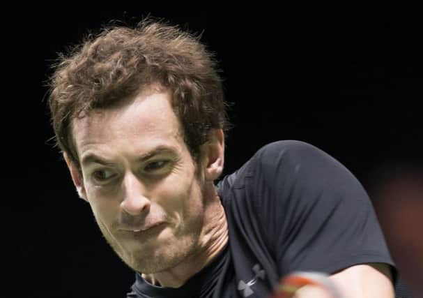 Andy Murray returns the ball to Nicolas Mahut during his straight sets win in Rotterdam. Picture: AFP/Getty