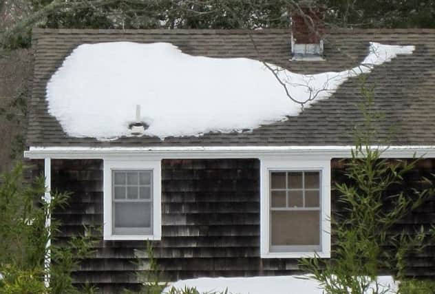The whale-shaped snow on the Sag Harbor roof. Picture: Joe Markowski