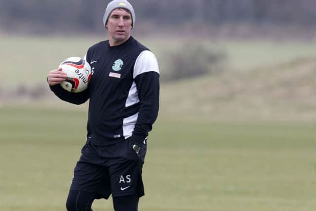 Hibernian manager Alan Stubbs prepares his squad at training. Picture: SNS