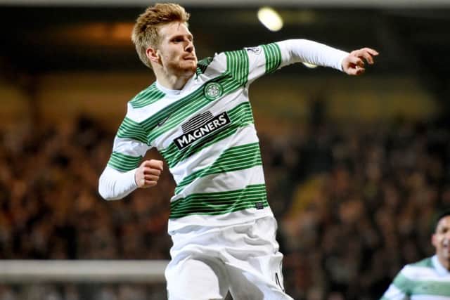 Stuart Armstrong celebrates scoring Celtic's second on his debut. Picture: SNS