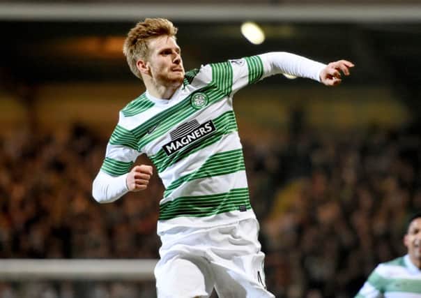 Stuart Armstrong celebrates scoring Celtic's second on his debut. Picture: SNS
