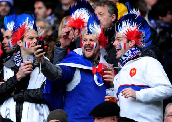 French fans party at Murrayfield during last year's clash between Scotland and France.
 Picture: Ian Rutherford