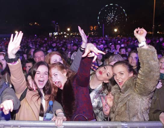 New Year revellers at the capitals street party had a good time, despite the crush. Picture HeMedia