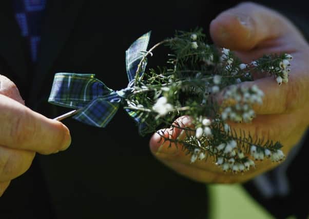 A sprig of white heather has been considered a good luck charm in Scotland for hundreds of years. Picture: Getty