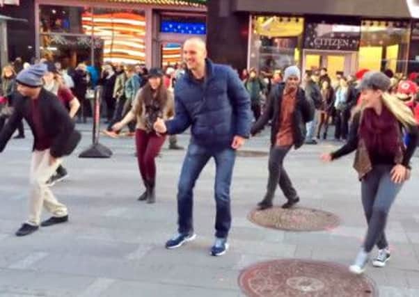 Former Hibs goalkeeper Sean Murdoch enlisted the help of a flash dance mob in Times Square, NY. Picture: YouTube