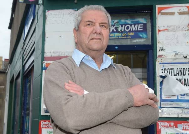 Ahmed Ali fought off the armed robbers in his shop. Picture: Neil Hanna