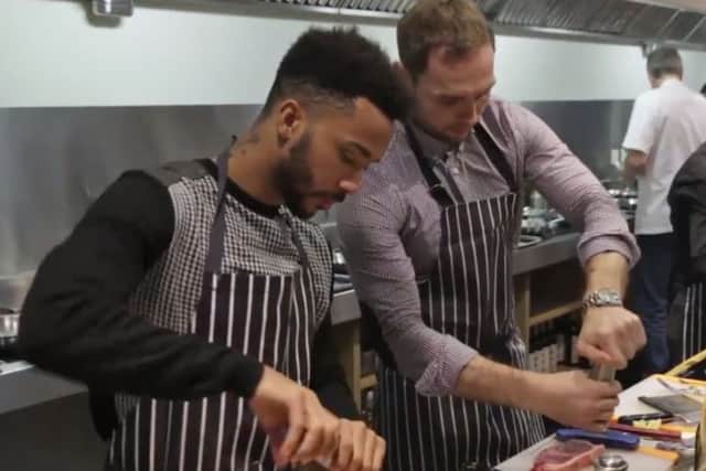 Shay Logan and Russell Anderson get their steak on. Picture: Contributed