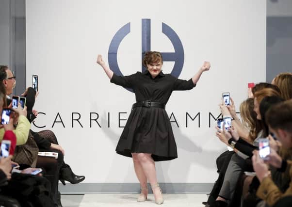 Jamie Brewer walks the runway during the Role Models Not Runway Models show. Picture: Getty