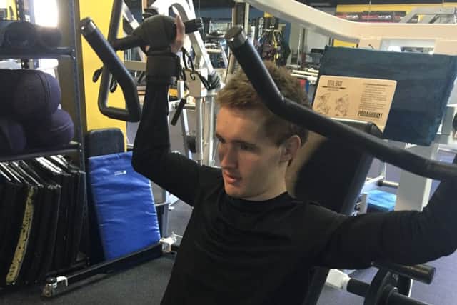 Long road ahead: Connor Hughes is working in San Diego to try to re-engage abdominal muscles and back extensors. Picture: Contributed