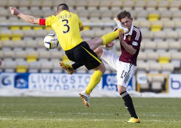 Jason Talbot was booked for this challenge but accepted a retrospective ban. Picture: SNS