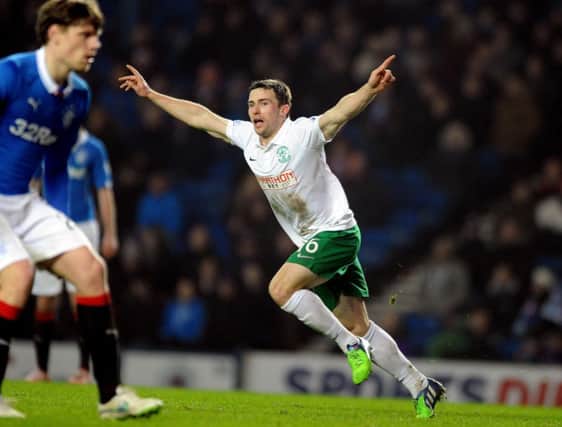 Hibs hero Lewis Stevenson celebrates after his spectacular volley sealed a 2-0 win. Picture: Lisa Ferguson