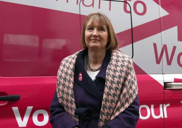Deputy Labour leader, Harriet Harman, stands next a pink van launched during a Labour campaign aimed at women voters. Picture: Getty