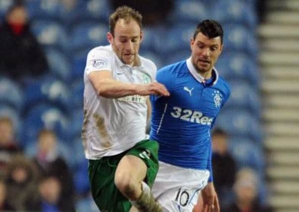 David Gray, top, in action in Govan on Friday with Rangers Haris Vuckic, also got on the scoresheet during Hibs 3-1 win  at Ibrox in October. Photograph: Lisa Ferguson