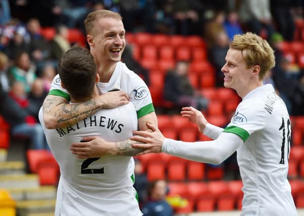 Celtic's Leigh Griffiths (2nd from left) celebrates his goal with team-mate Adam Matthews and Gary Mackay-Steven. Picture: SNS Group