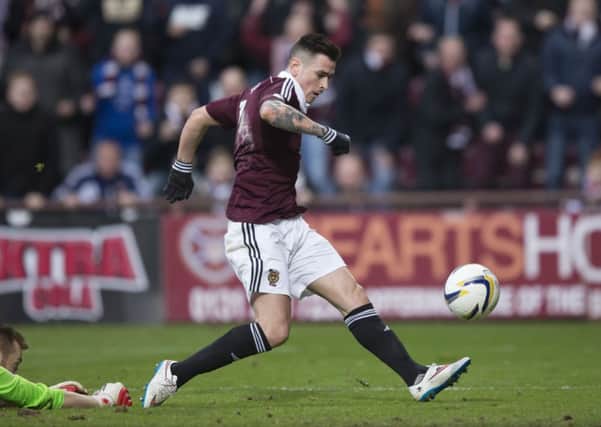 Hearts' Jamie Walker fires the ball into the net to give his side the lead. Picture: SNS
