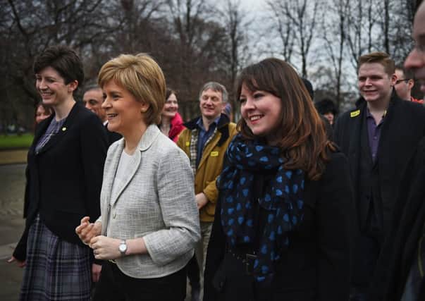 First Minister Nicola Sturgeon on the campaign trail with SNP candidates in Glasgow. Picture: Getty