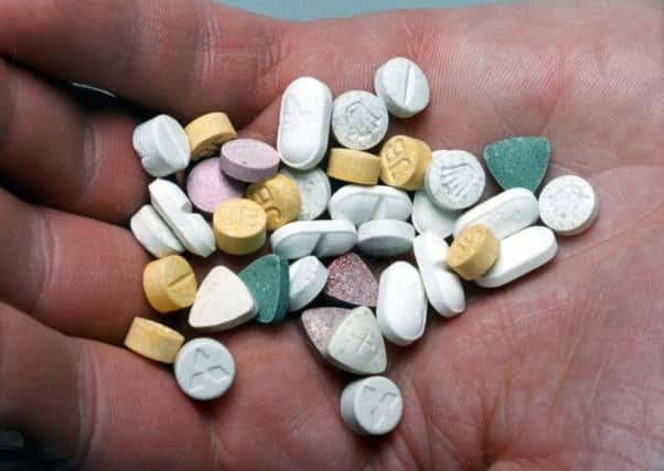 An assortment of ecstasy tablets. A former UK drugs adviser has called for illicit drugs such as cannabis and ecstasy to be used to treat patients. Picture: PA