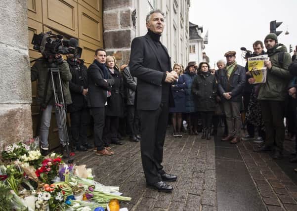 François Zimeray, the French ambassador to Denmark, delivers a speech in front of the French Embassy in Copenhagen. Picture: Getty