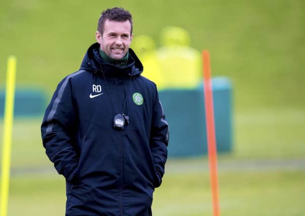 Ronny Deila oversees a training session at Celtic's Lennoxtown complex. Picture: SNS