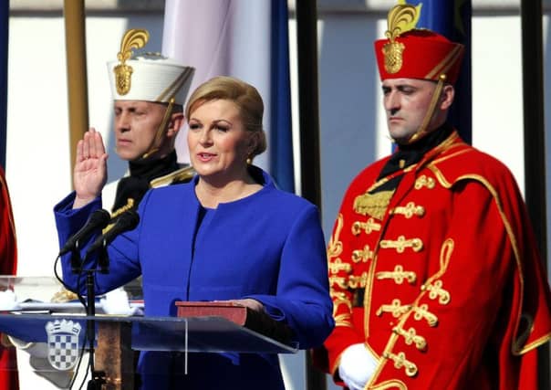 Kolinda Grabar-Kitarovic is sworn in. She said she would restart the economy. Picture: Getty