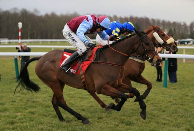 The Lucinda Russell-trained Lie Forrit, near side, rolls back the years to win at Haydock. Picture: PA