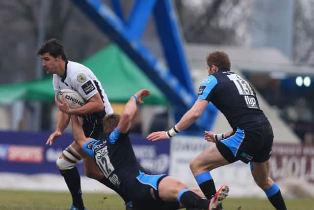 Fraser Lyle flies in to try and stop a Zebre attack during today's Pro12 clash. Picture: Zebre Rugby