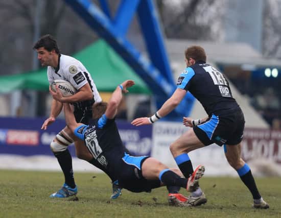 Fraser Lyle flies in to try and stop a Zebre attack during today's Pro12 clash. Picture: Zebre Rugby