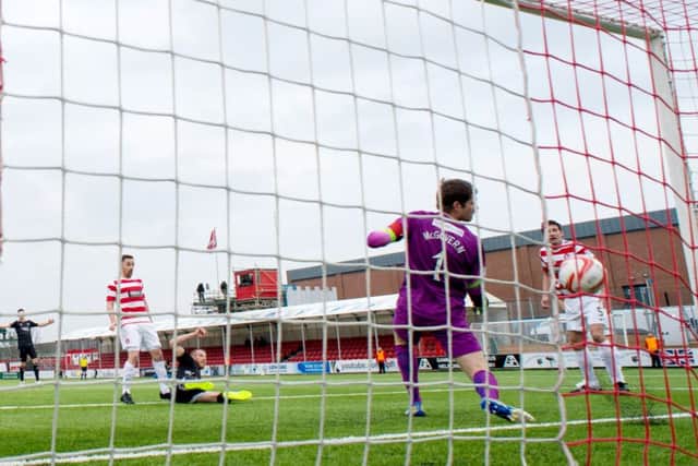 Adam Rooney strikes but the ball was ruled as having not crossed the line. Picture: SNS