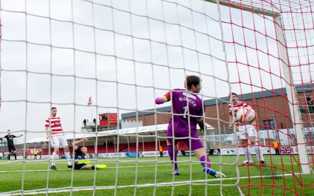 Adam Rooney strikes but the ball was ruled as having not crossed the line. Picture: SNS