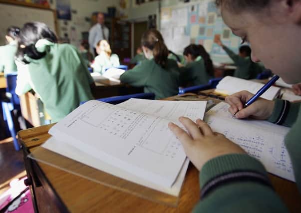 John Swinney has threatened councils over teacher numbers. Picture: Getty