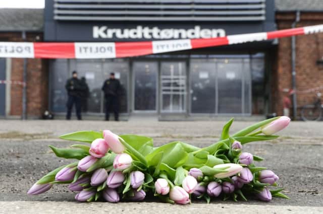 Flowers lie outside the scene of the freespeech meeting shootings. Picture: Getty