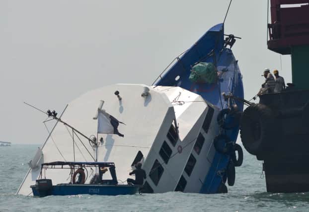The Hong Kong Electric boat, half-submerged after accident. Picture: AFP
