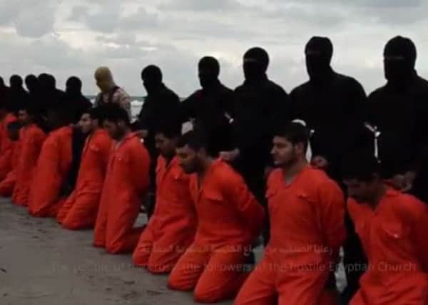 A still image from the horrific video which purports to show the 21 Egyptian hostages. Picture: Universal News & Sport