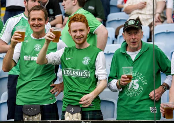 While Hibs fans can enjoy a peaceful drink abroad, alcohol is barred at home. Picture: SNS