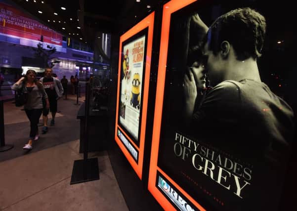 People attend a screening of Fifty Shades of Grey. The arrests were made at Glasgow's Grosvenor Cinema. Picture: Getty